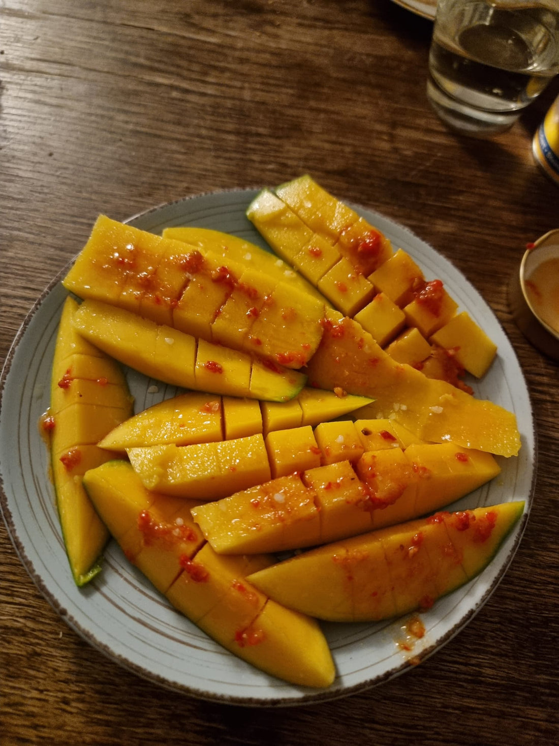 Moja Chili Oil drizzled on mangos